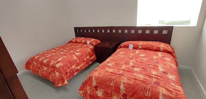 Stylish condo near pool and beach.