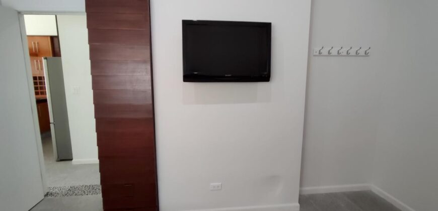 Stylish condo near pool and beach.