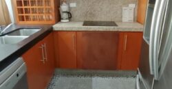 Stylish condo near pool and beach.