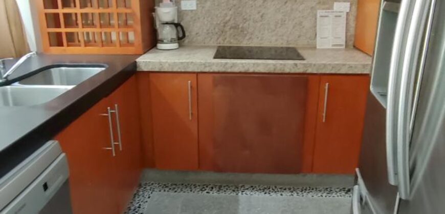 Stylish condo near pool and beach.