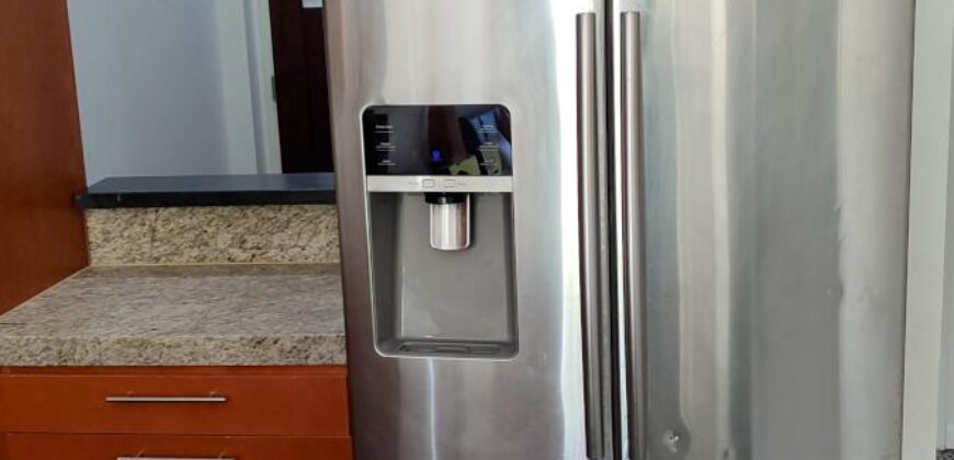 Stylish condo near pool and beach.