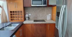 Stylish condo near pool and beach.