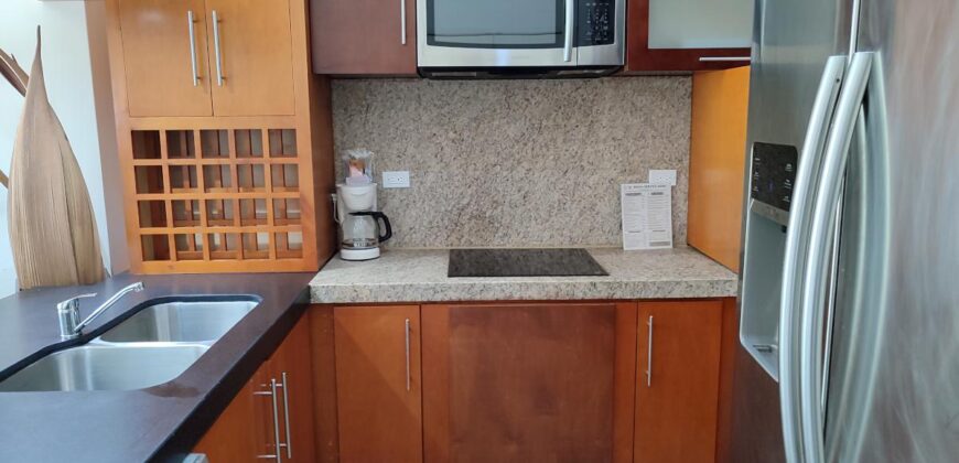 Stylish condo near pool and beach.