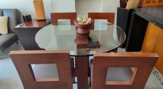 Stylish condo near pool and beach.