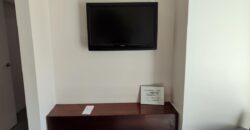 Stylish condo near pool and beach.