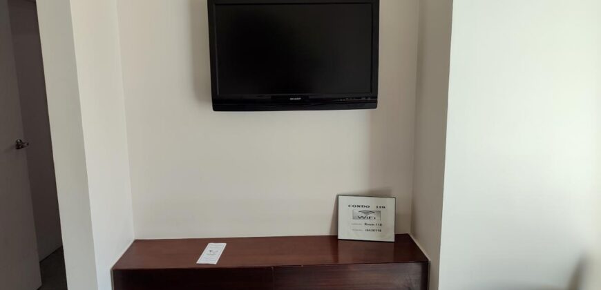 Stylish condo near pool and beach.