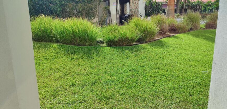 Stylish condo near pool and beach.