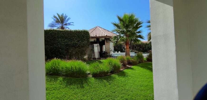 Stylish condo near pool and beach.