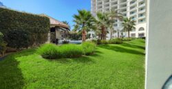 Stylish condo near pool and beach.