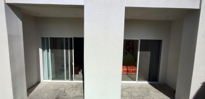 Stylish condo near pool and beach.