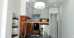 Stylish condo near pool and beach.