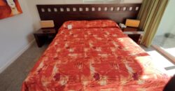 Stylish condo near pool and beach.