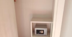 Stylish condo near pool and beach.