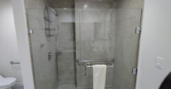 Stylish condo near pool and beach.