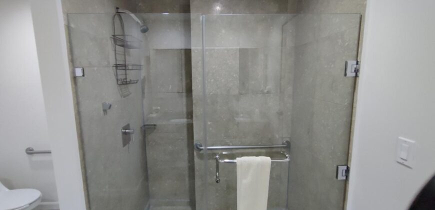 Stylish condo near pool and beach.