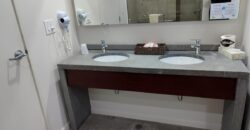 Stylish condo near pool and beach.