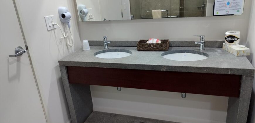 Stylish condo near pool and beach.