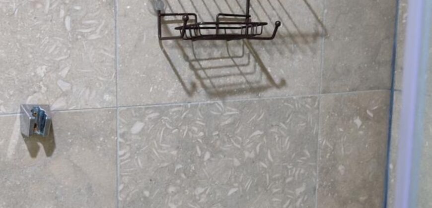 Stylish condo near pool and beach.