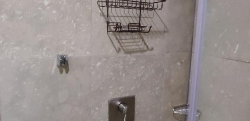 Stylish condo near pool and beach.