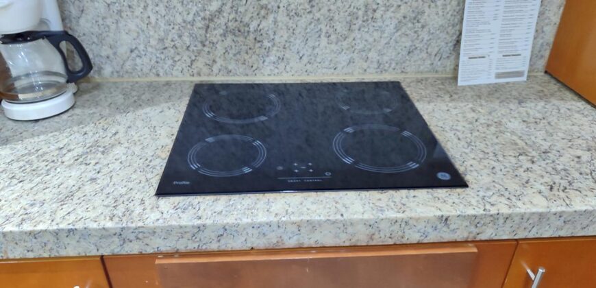 Stylish condo near pool and beach.