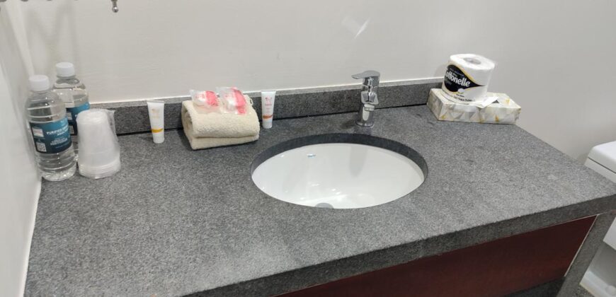 Stylish condo near pool and beach.