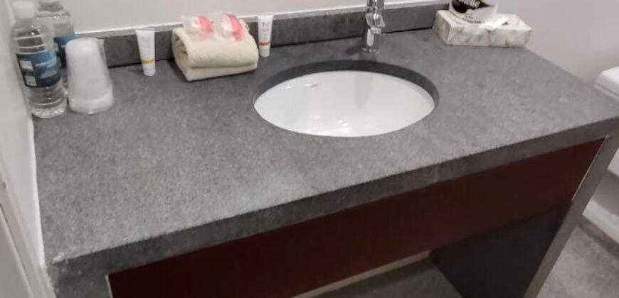 Stylish condo near pool and beach.