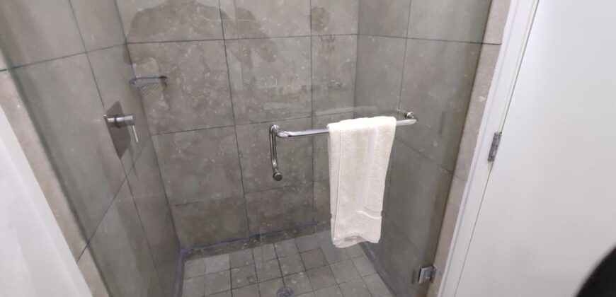 Stylish condo near pool and beach.